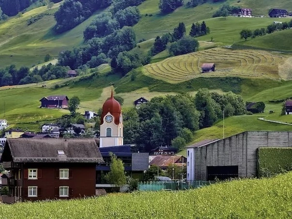 A rural settlement surround by fields. 