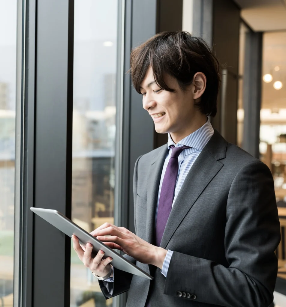 Man using an iPad.