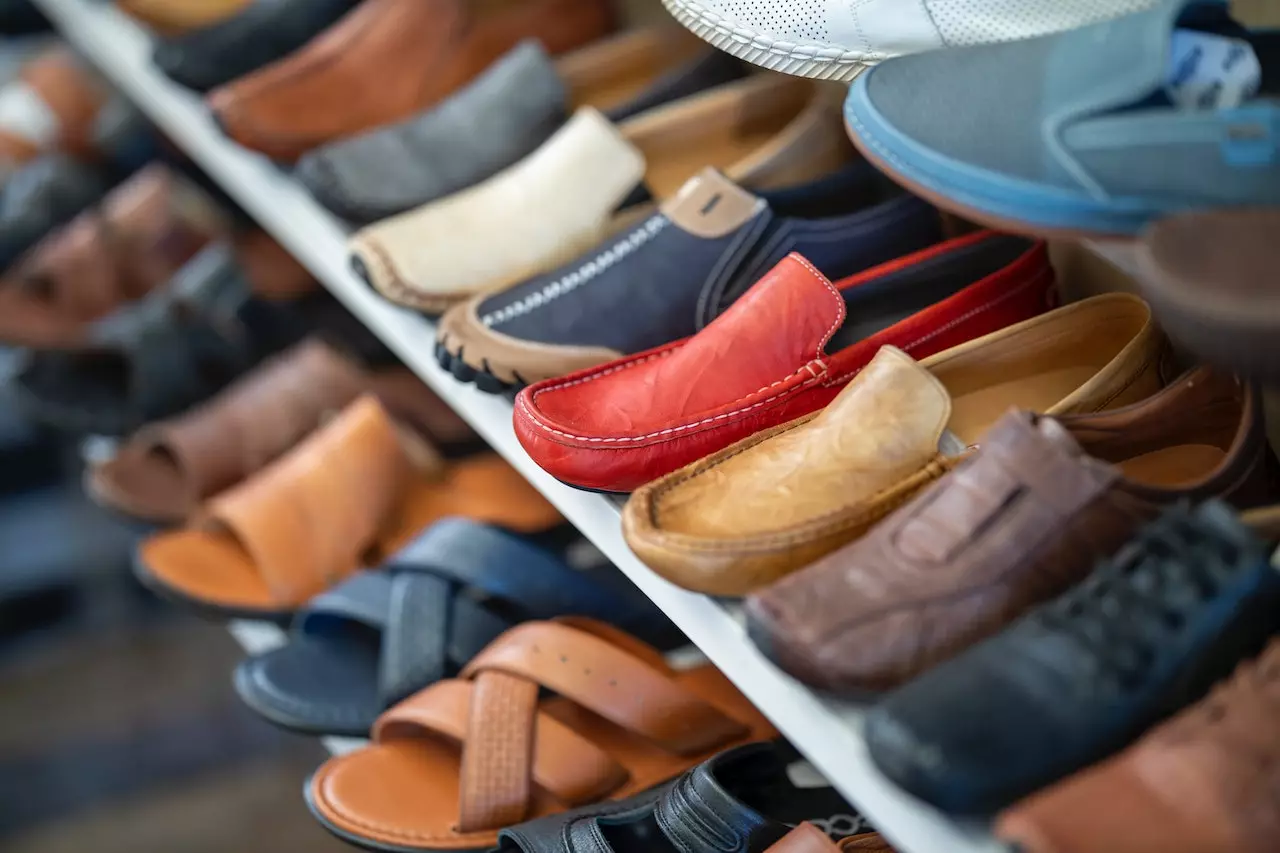 A rack of shoes in a store.